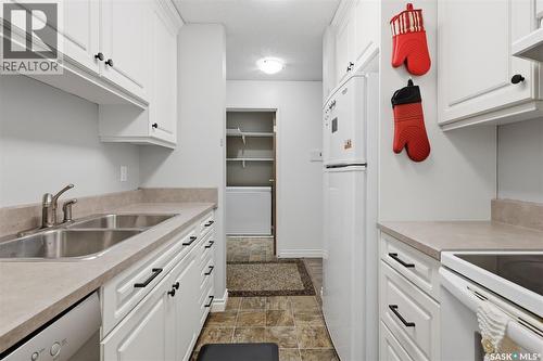 717 310 Stillwater Drive, Saskatoon, SK - Indoor Photo Showing Kitchen With Double Sink