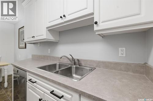 717 310 Stillwater Drive, Saskatoon, SK - Indoor Photo Showing Kitchen With Double Sink