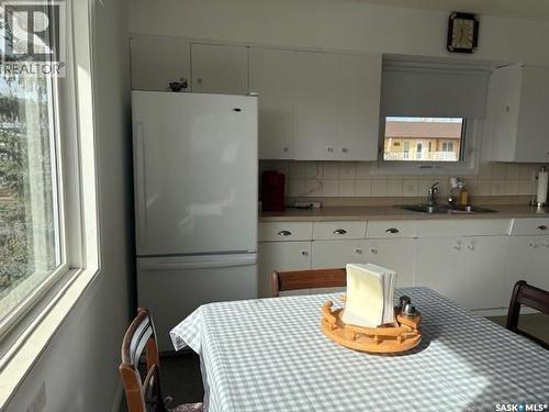 211 Throne Street, Sceptre, SK - Indoor Photo Showing Kitchen With Double Sink