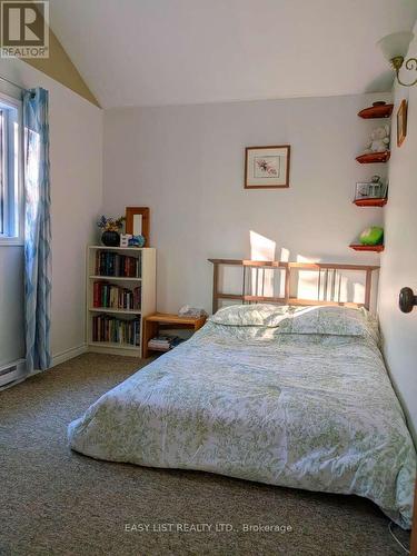 2135 Champlain Road, Tiny, ON - Indoor Photo Showing Bedroom