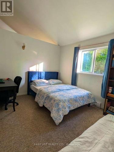 2135 Champlain Road, Tiny, ON - Indoor Photo Showing Bedroom
