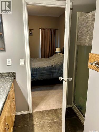 418 Crystal Crescent, Warman, SK - Indoor Photo Showing Bedroom