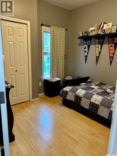 418 Crystal Crescent, Warman, SK - Indoor Photo Showing Bedroom