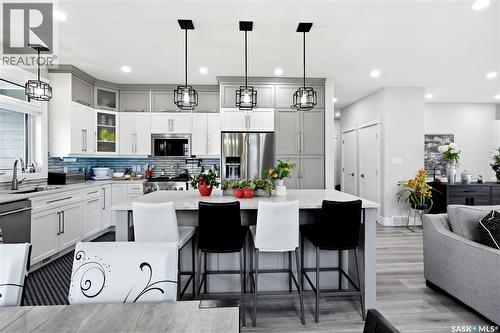 701 Casper Crescent, Warman, SK - Indoor Photo Showing Kitchen With Upgraded Kitchen