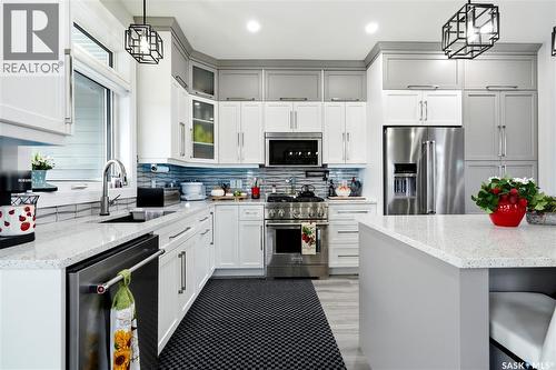 701 Casper Crescent, Warman, SK - Indoor Photo Showing Kitchen With Upgraded Kitchen