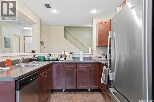 210 515 28Th Street E, Prince Albert, SK - Indoor Photo Showing Kitchen With Stainless Steel Kitchen With Double Sink