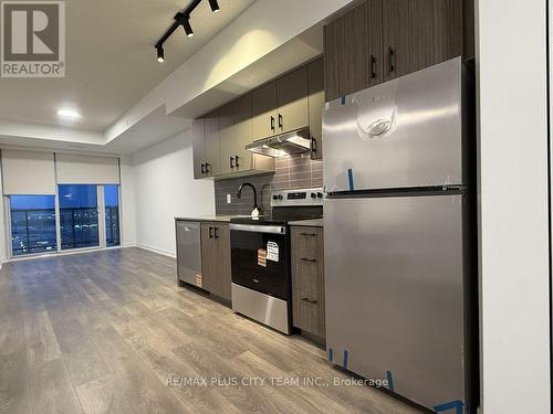 C706 - 4878 Powers Common, Burlington, ON - Indoor Photo Showing Kitchen With Stainless Steel Kitchen