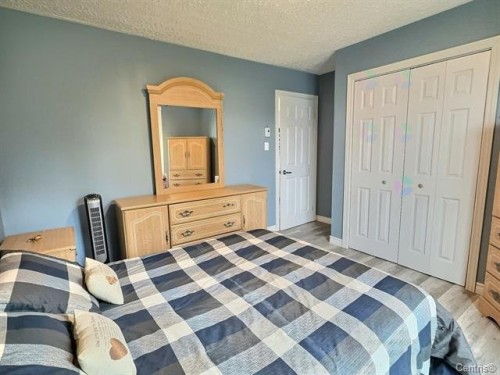 Chambre à coucher principale - 69 10E Avenue O., Palmarolle, QC - Indoor Photo Showing Bedroom