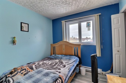 Chambre à coucher - 69 10E Avenue O., Palmarolle, QC - Indoor Photo Showing Bedroom