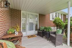 Enjoy your morning coffee on this covered porch - 
