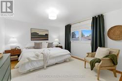 A large primary bedroom - fits a king size bed - 