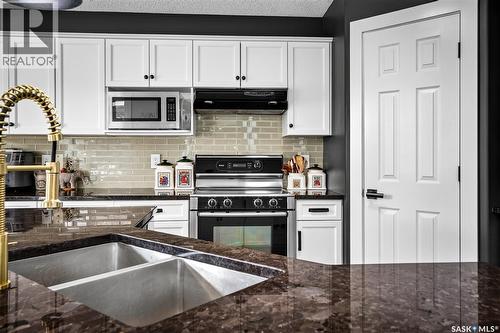 69 Goldenglow Drive, Moose Jaw, SK - Indoor Photo Showing Kitchen With Double Sink