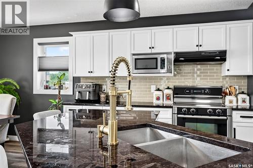 69 Goldenglow Drive, Moose Jaw, SK - Indoor Photo Showing Kitchen With Stainless Steel Kitchen With Double Sink With Upgraded Kitchen