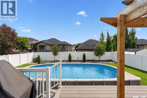 69 Goldenglow Drive, Moose Jaw, SK - Outdoor With In Ground Pool With Deck Patio Veranda With Backyard