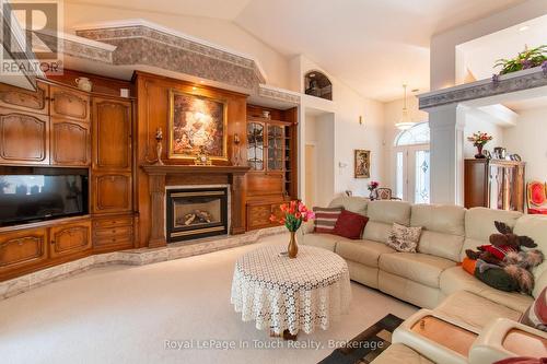 58 Mourning Dove Trail, Tiny, ON - Indoor Photo Showing Living Room With Fireplace