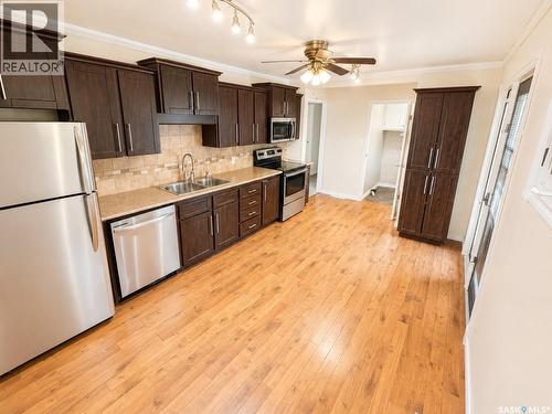 1410 4Th Avenue N, Regina, SK - Indoor Photo Showing Kitchen With Double Sink