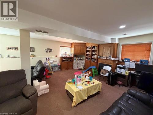 Spacious room with recessed lighting and a neutral color palette - 436 Gatestone Boulevard, Waterloo, ON - Indoor