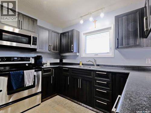 1002 King Street, Rosetown, SK - Indoor Photo Showing Kitchen With Double Sink