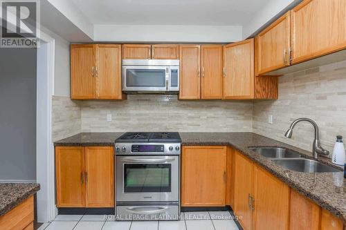 63 Lord Simcoe Drive, Brampton, ON - Indoor Photo Showing Kitchen With Double Sink
