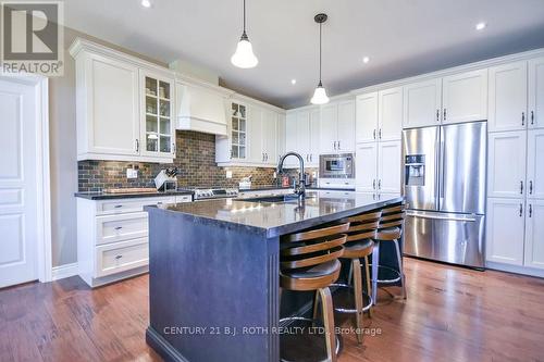 2 Roy Hickling Drive, Springwater, ON - Indoor Photo Showing Kitchen With Upgraded Kitchen