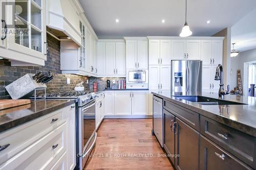 2 Roy Hickling Drive, Springwater, ON - Indoor Photo Showing Kitchen With Double Sink With Upgraded Kitchen