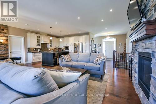 2 Roy Hickling Drive, Springwater, ON - Indoor Photo Showing Living Room With Fireplace