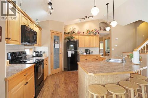 372 Lake Stafford Drive E, Brooks, AB - Indoor Photo Showing Kitchen With Double Sink