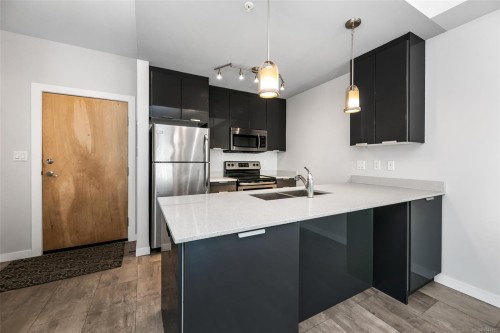 #302-2871 Jacklin Rd, Langford, BC - Indoor Photo Showing Kitchen With Stainless Steel Kitchen With Double Sink With Upgraded Kitchen