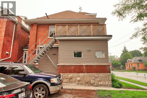 Rear of Structure and Parking Area - 189 Prospect Street S, Hamilton, ON - Outdoor With Exterior