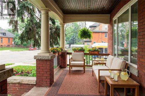 Virtually Staged Front Porch - 189 Prospect Street S, Hamilton, ON - Outdoor With Deck Patio Veranda With Exterior