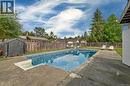 AI Removed plants around the pool - 2605 Soderholm Rd, Campbell River, BC  - Outdoor With In Ground Pool With Backyard 