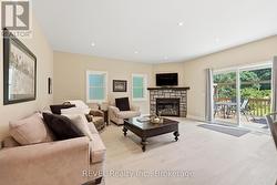 cozy living room with walk out patio - 