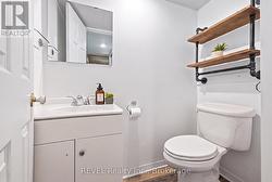 Guest cottage main floor powder room - 