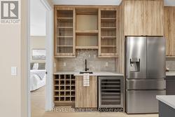 wet bar/coffee bar w wine fridge & wine rack - 