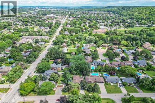 Aerial perspective showcasing a residential area with extensive tree canopy - 3 Orchard Parkway, Grimsby, ON - Outdoor With View