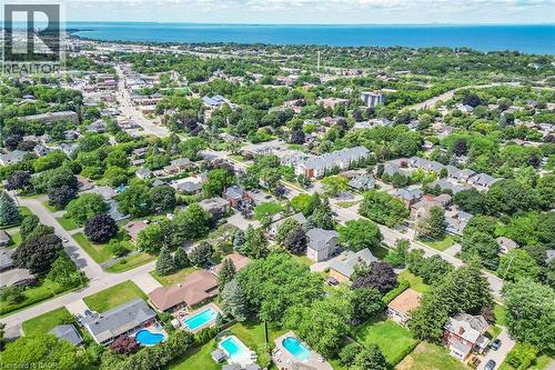Aerial perspective of a residential area featuring established homes and abundant mature trees - 3 Orchard Parkway, Grimsby, ON - Outdoor With View