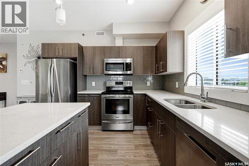 314 142 Pawlychenko Lane, Saskatoon, SK - Indoor Photo Showing Kitchen With Double Sink With Upgraded Kitchen