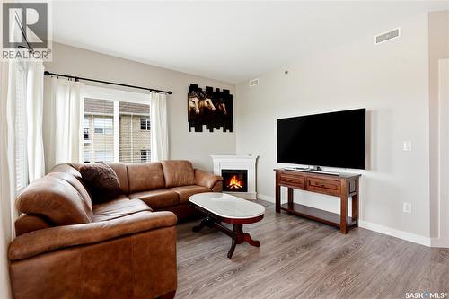 314 142 Pawlychenko Lane, Saskatoon, SK - Indoor Photo Showing Living Room With Fireplace