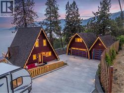 Driveway showing the garage and home. - 