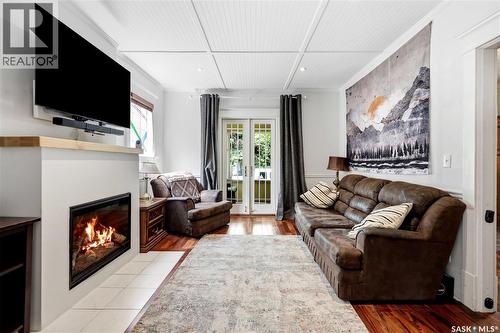 518 10Th Street E, Saskatoon, SK - Indoor Photo Showing Living Room With Fireplace