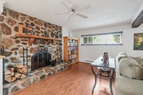 Sous-sol - 7305 Rue Turner, Brossard, QC - Indoor Photo Showing Living Room With Fireplace