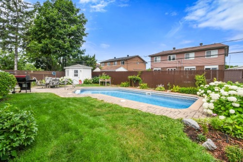 Cour - 7305 Rue Turner, Brossard, QC - Outdoor With In Ground Pool With Backyard