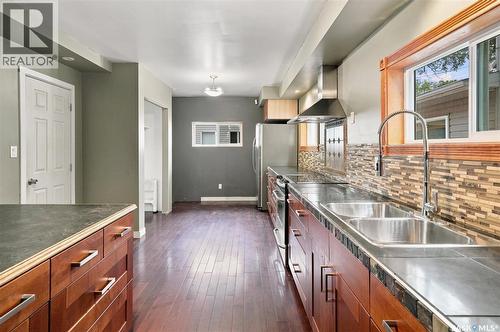 406 27Th Street W, Saskatoon, SK - Indoor Photo Showing Kitchen With Double Sink
