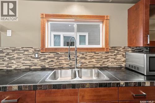 406 27Th Street W, Saskatoon, SK - Indoor Photo Showing Kitchen With Double Sink