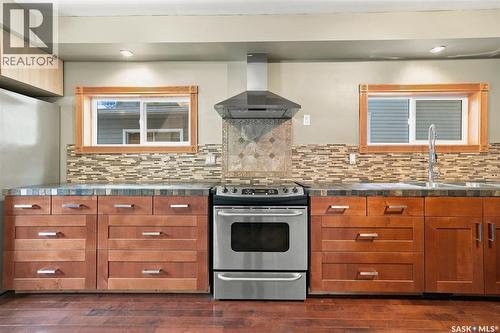 406 27Th Street W, Saskatoon, SK - Indoor Photo Showing Kitchen With Double Sink With Upgraded Kitchen