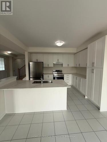 127 Oakmont Drive, Loyalist, ON - Indoor Photo Showing Kitchen With Double Sink