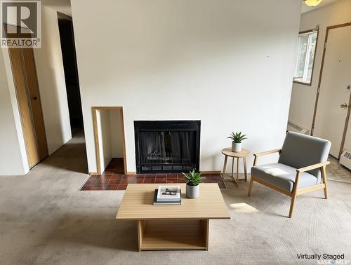 202 15 Alport Crescent, Regina, SK - Indoor Photo Showing Living Room