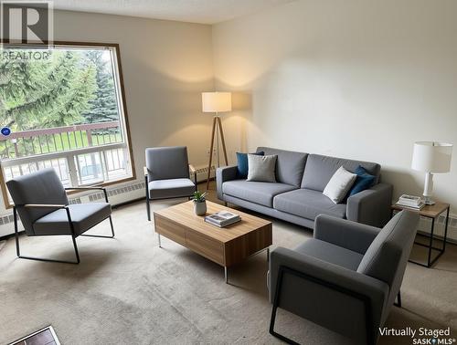 202 15 Alport Crescent, Regina, SK - Indoor Photo Showing Living Room