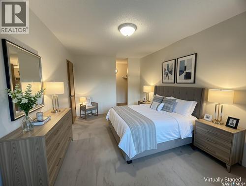 202 15 Alport Crescent, Regina, SK - Indoor Photo Showing Bedroom
