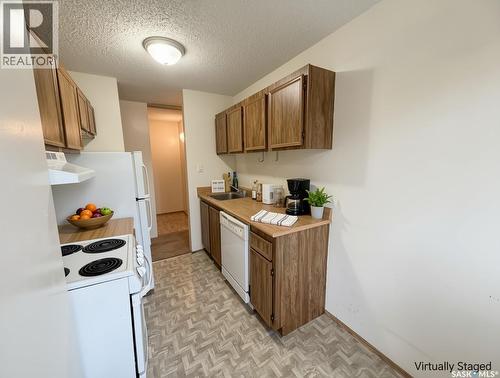 202 15 Alport Crescent, Regina, SK - Indoor Photo Showing Kitchen